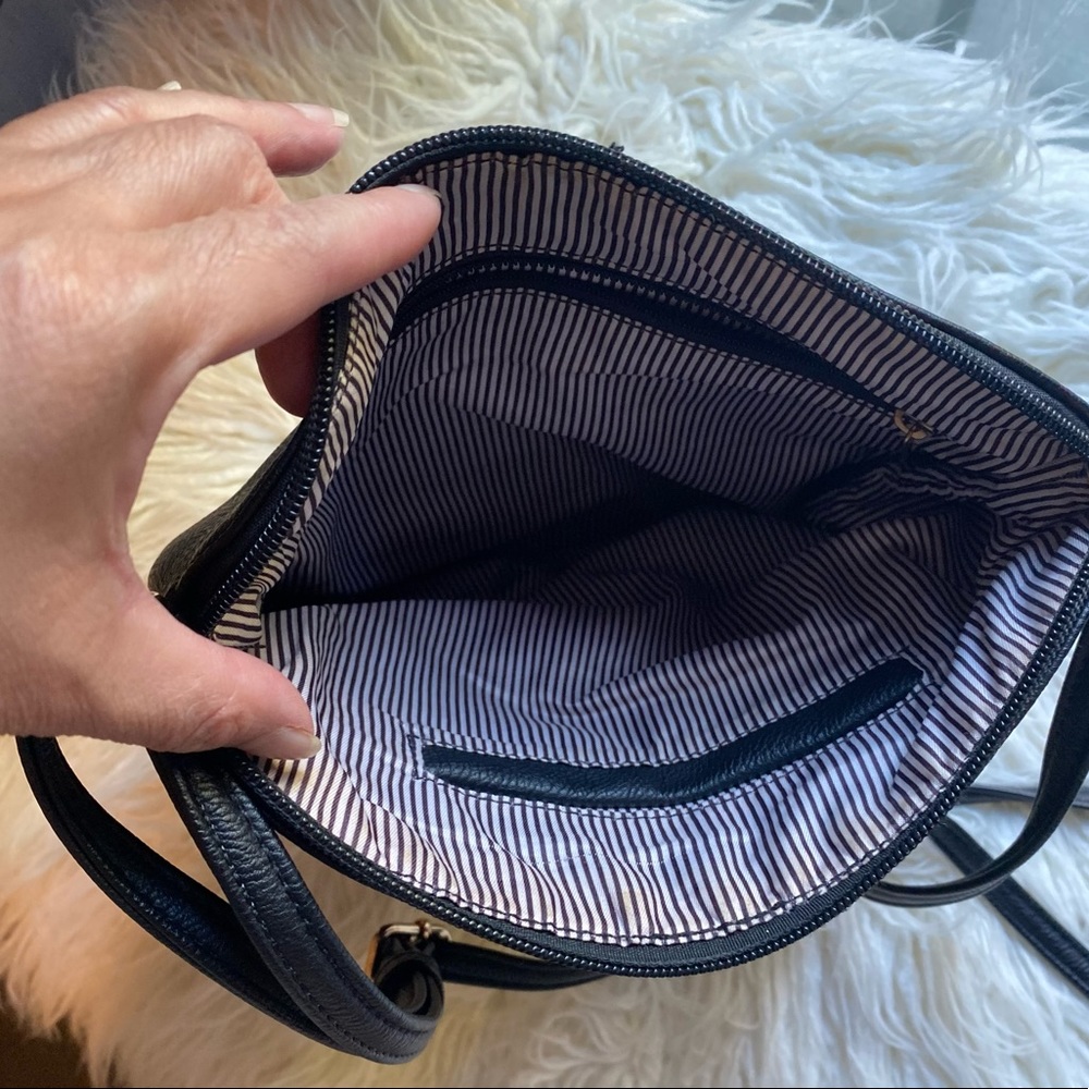 Black crossbody purse.